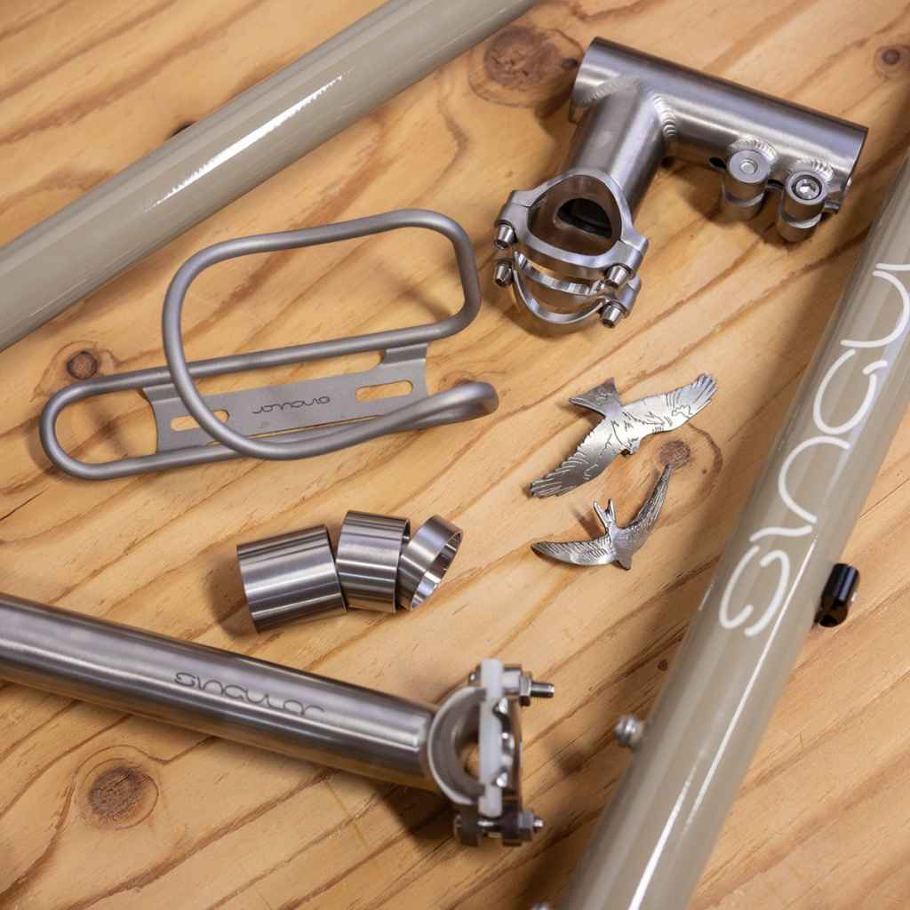 SINGULAR CYCLES* Ti bottle cage - BLUE LUG ONLINE STORE