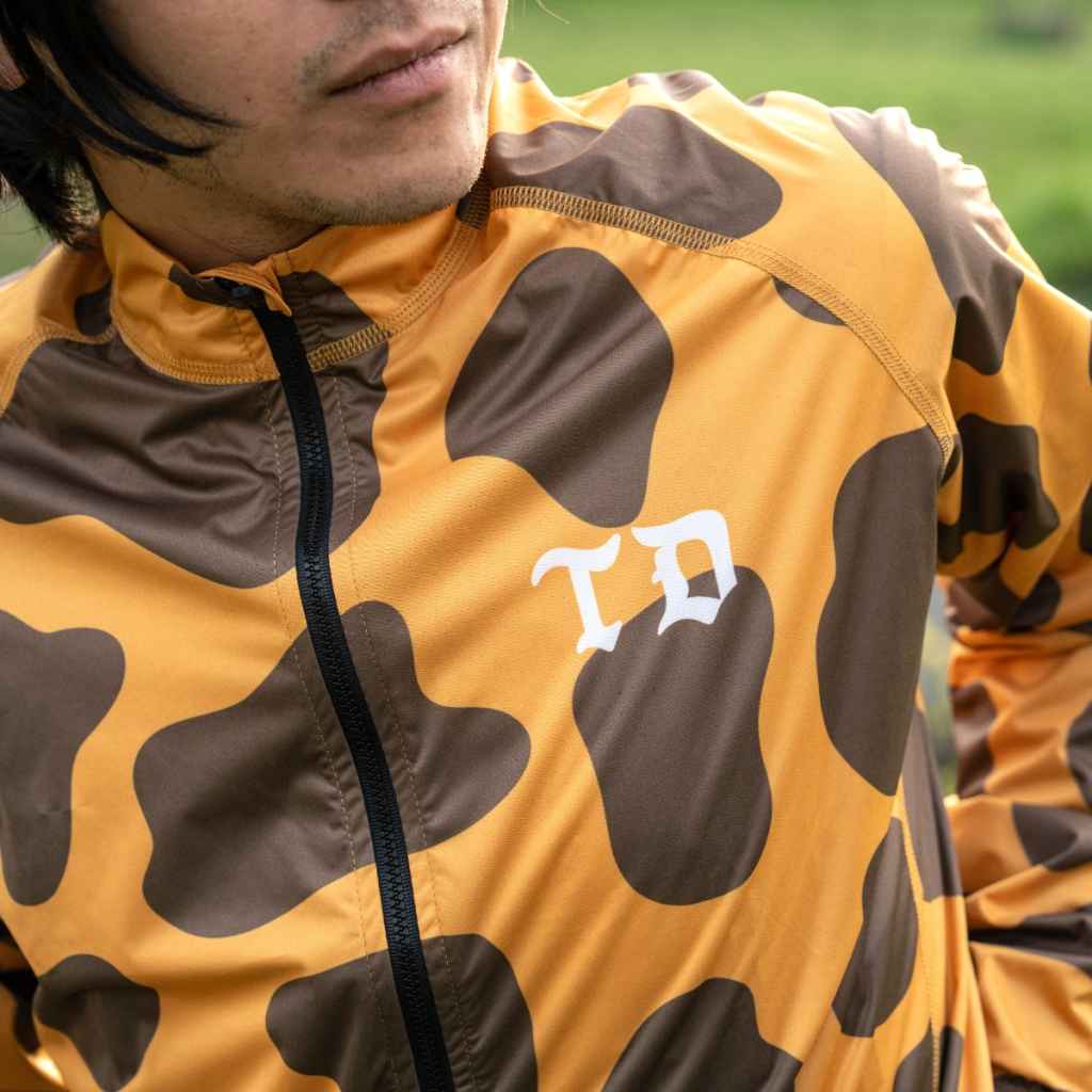 TEAMDREAM bicycling タイガー柄ジレ TEAM DREAM* euro vacay giraffe pakable wind jacket - BLUE LUG